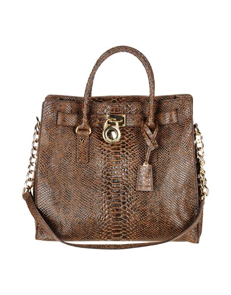 michael kors browm bag|brown suede Michael Kors handbags.